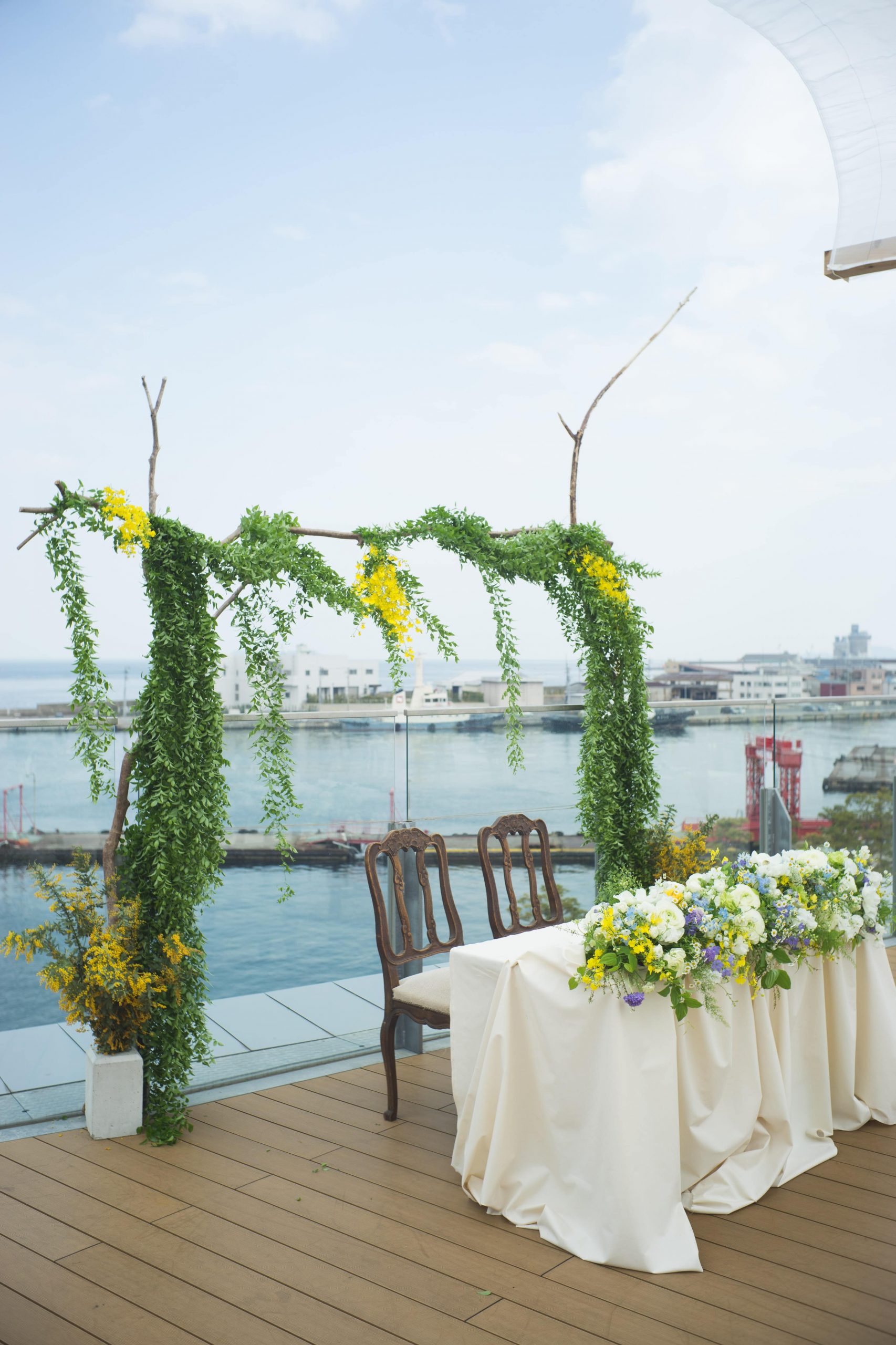 グリーンを使った高砂アーチ